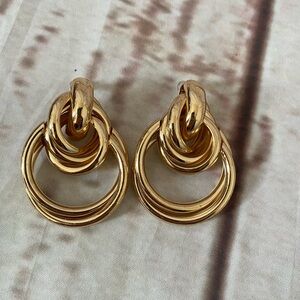 Gold colored earrings